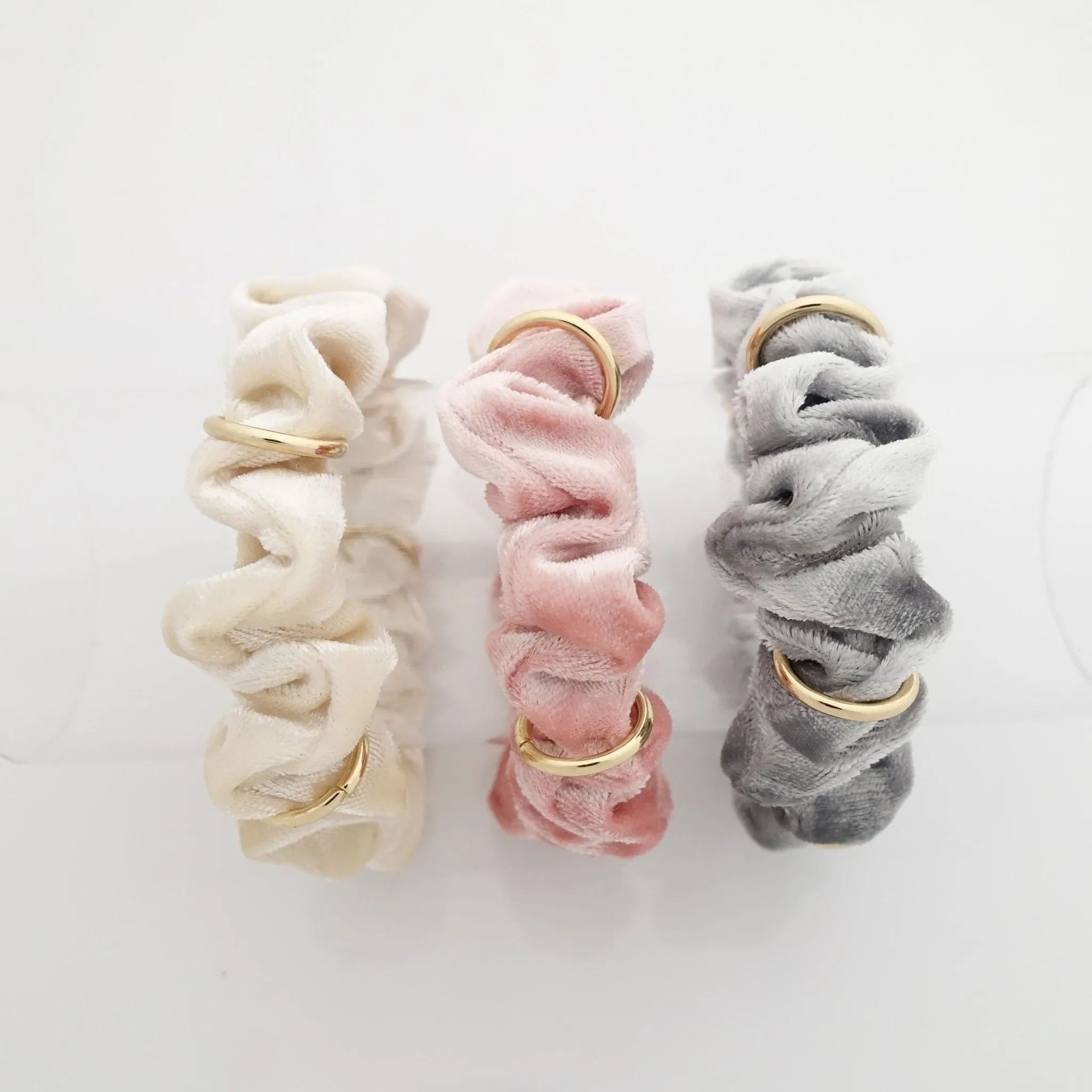 A set of 3 golden ring decorated mini thin velvet scrunchies pack